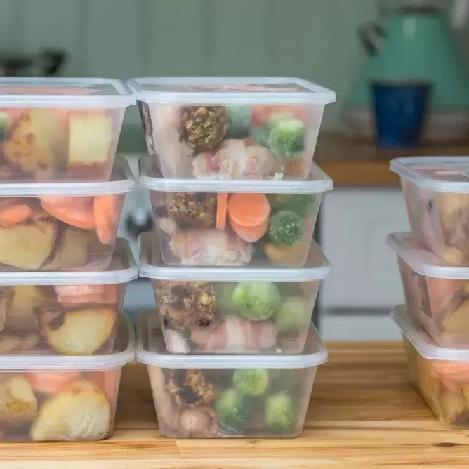 freezer meals in plastic Tupperware containers