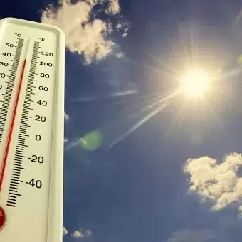 a thermometer indicating really hot temperatures