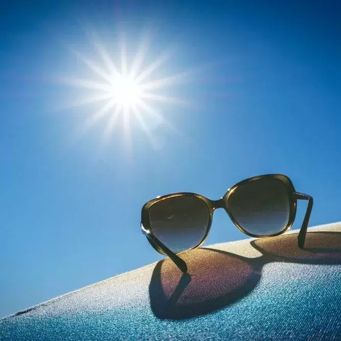 Sunglasses facing the sun.